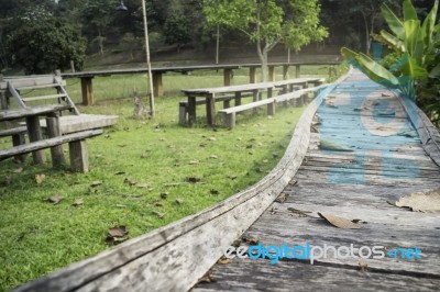 Outdoor Wooden Furniture In Field Stock Photo