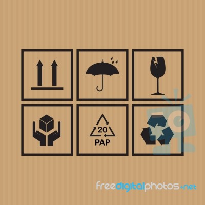 Packaging Symbols Set On Cardboard Background Stock Image