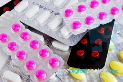 Packs Of Colorful Medicine Pills Background Stock Photo