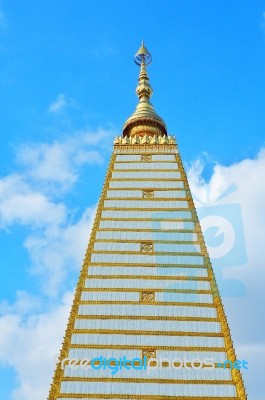 Pagoda At Wat Phrathat Nong Bua Against Blue Sky Stock Photo