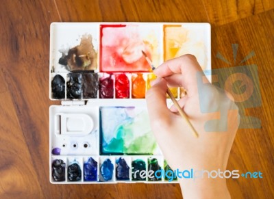 Paintbrush And Paint Palette Stock Photo