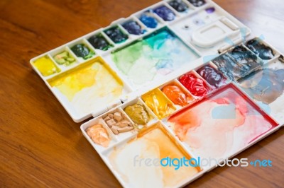 Paintbrush And Paint Palette Stock Photo