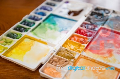 Paintbrush And Paint Palette Stock Photo