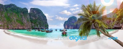 Panorama Of Long Boat And Blue Water At Maya Bay In Phi Phi Island, Krabi Thailand Stock Photo