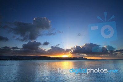 Panoramic Dramatic Tropical Sunset Sky And Sea At Dusk Stock Photo