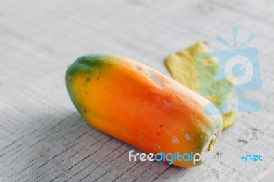 Papaya Is Ripe On Wood Stock Photo