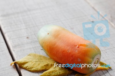 Papaya Is Ripe On Wood Stock Photo