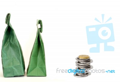 Paper Bag With Coins Stock Photo