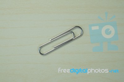 Paper-clips.on Wood Background Stock Photo