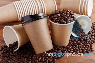 Paper Coffee Cups With Beans Stock Photo