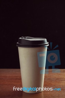 Paper Cup On Wood Stock Photo