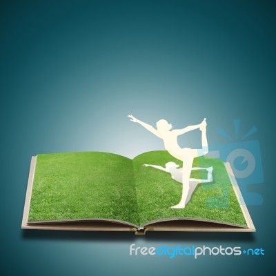 Paper Cut Of Girl Doing Yoga In Book Stock Image