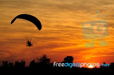 Paramotor Against Twilight Sky Stock Photo