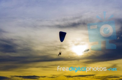 Paramotor In Sunset Sky Stock Photo