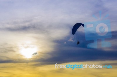 Paramotor In Sunset Sky Stock Photo