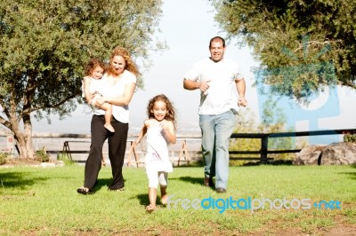 Parents Playing With Kids Stock Photo