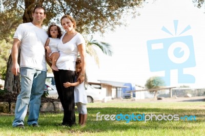 Parents With Two Kids Stock Photo