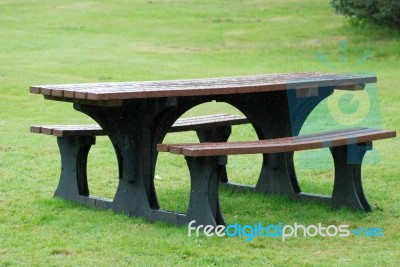 Park Bench In The Rain Stock Photo