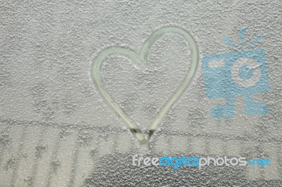 Parked Car Covered With The First Snow In Winter Stock Photo