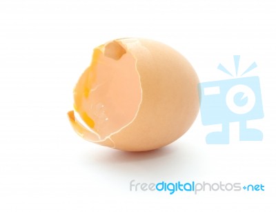 Part Of Eggshell Broken On White Floor Stock Photo