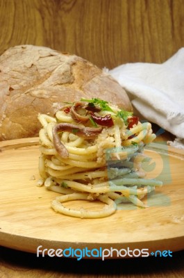 Pasta Noddles On Wooden Plate Stock Photo