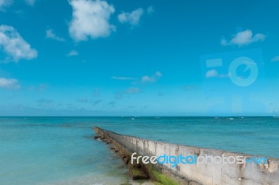 Path Walk Way Wall Extend To Clean Blue Sea On Nice Blue Cloud Sky Vacation Day Stock Photo