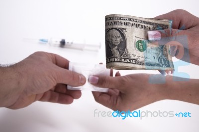 Payment Of A Drug Dose Stock Photo