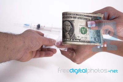 Payment Of A Drug Dose Stock Photo