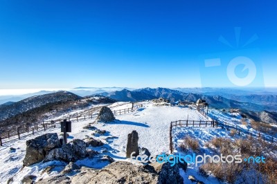 Peak Of Deogyusan Mountains With Morning Fog In Winter, South Korea Stock Photo