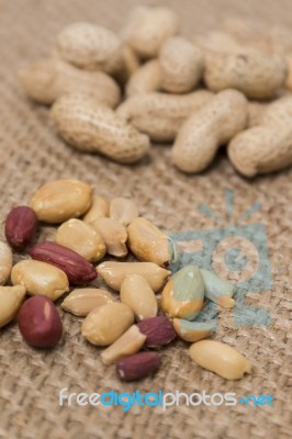 Peanuts On A Burlap Background Stock Photo