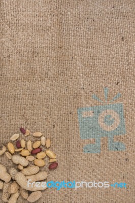 Peanuts On A Burlap Background Stock Photo