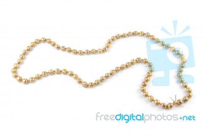 Pearl Necklace Racing Track On White Stock Photo