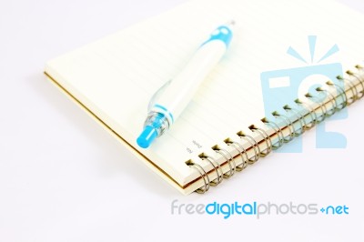 Pen And Notebook Stock Photo