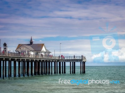 People Enjoying A Sunny Day Out On Southwold Pier Stock Photo