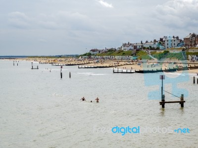 People Enjoying The Beach At Southwold Stock Photo