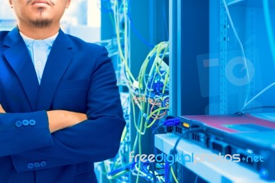 People Fix Core Switch In Network Room Stock Photo