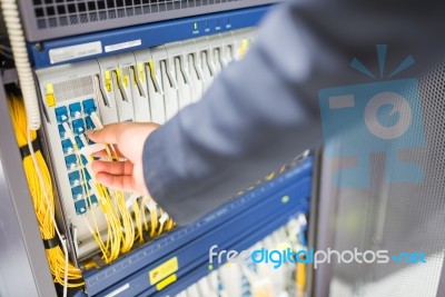 People Fix Node Fiber Optic In Network Room Stock Photo