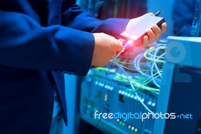 People Fix Node Fiber Optic In Network Room Stock Photo