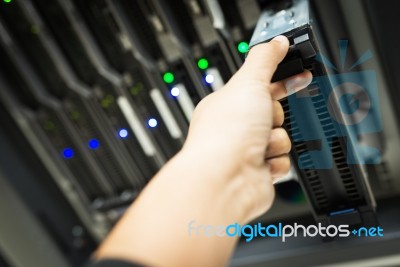 People Fix Node Fiber Optic In Network Room Stock Photo