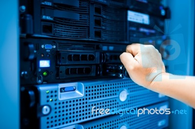 People Fix Server Network In Data Room Stock Photo