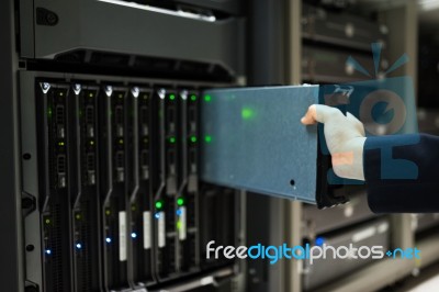 People Fix Server Network In Data Room Stock Photo