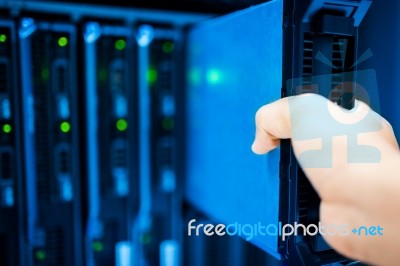 People Fix Server Network In Data Room Stock Photo