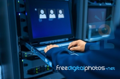 People Fix Server Network In Data Room Stock Photo