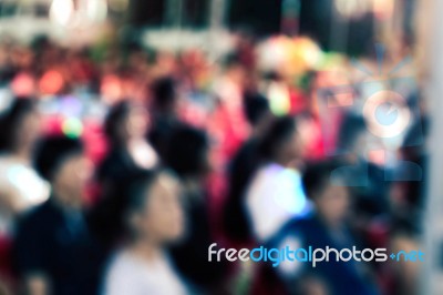 People On Chairs With Blurred Images Stock Photo