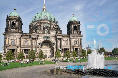 People Relaxing In Front Of Berlin Cathedral Stock Photo