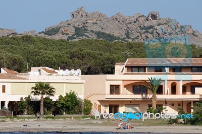 People Relaxing On The Beach At Palau In Sardinia Stock Photo