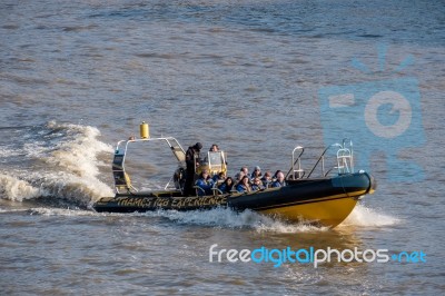 People Sightseeing London From An Inflatable Boat Stock Photo