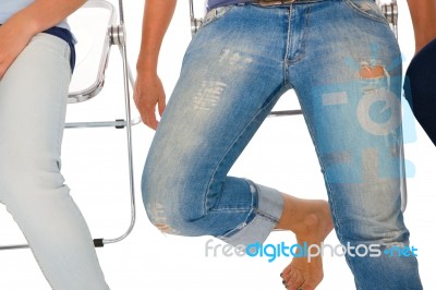 People Sitting On Chairs Stock Photo