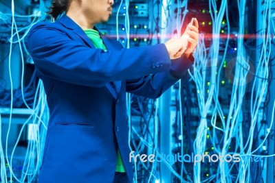 People Use Smart Phone In Datacenter Room Stock Photo