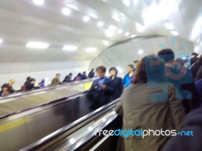 People Using Escalator Stock Photo